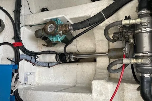 Picnic Boat Yacht Photos Pics Engine compartment of 2003 Legacy Yachts 34 Express, showing mechanical components and wiring.