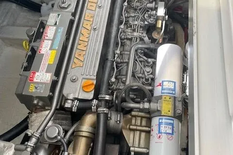 Picnic Boat Yacht Photos Pics Engine of 2003 Legacy Yachts 34 Express, featuring Yanmar diesel components.