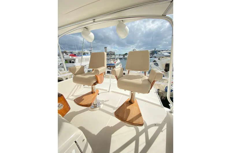 Cometa Yacht Photos Pics Luxury seating on 2012 Tiara Yachts 4800 Convertible, overlooking marina.
