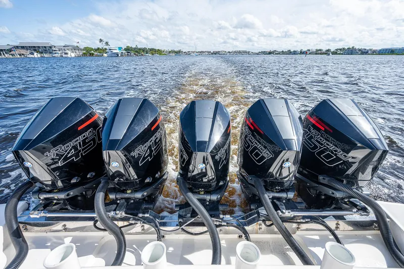 Mother Mary Yacht Photos Pics Four powerful outboard engines on a 2021 Gulf Crosser 52 boat cruising on water.