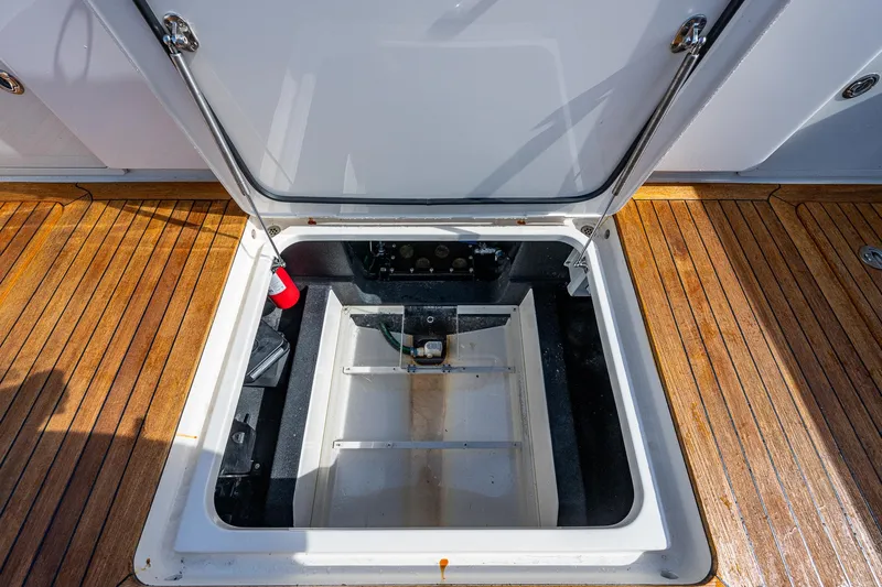 Mother Mary Yacht Photos Pics Open hatch on the 2021 Gulf Crosser 52 boat with teak deck.