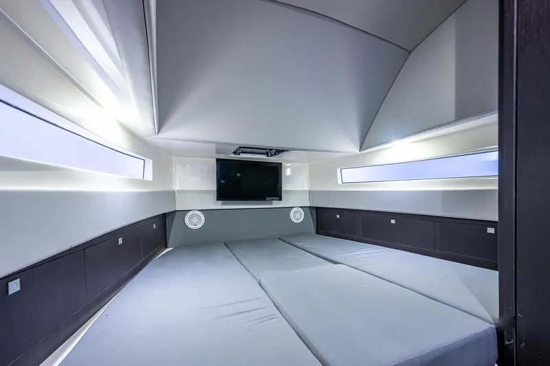 Mother Mary Yacht Photos Pics Luxurious interior cabin of 2021 Gulf Crosser 52 yacht with modern design and TV.