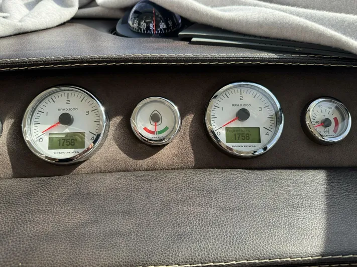 Blue Haven Yacht Photos Pics Dashboard gauges of a 2014 Prestige 620S yacht, displaying RPM and other metrics.