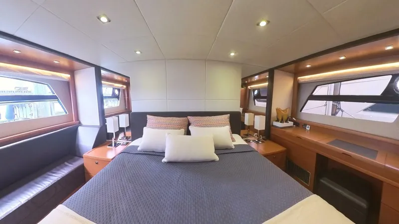 Blue Haven Yacht Photos Pics Luxurious cabin interior of 2014 Prestige 620S yacht with modern furnishings.