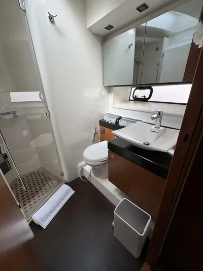 Blue Haven Yacht Photos Pics Luxurious bathroom in 2014 Prestige 620S yacht with modern fixtures and shower.