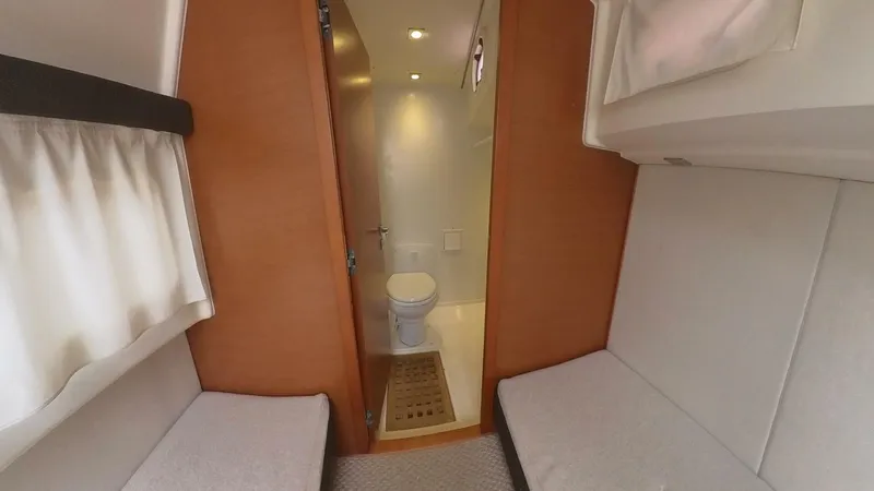 Blue Haven Yacht Photos Pics Interior cabin of 2014 Prestige 620S yacht with ensuite bathroom.