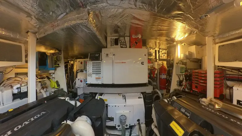 Blue Haven Yacht Photos Pics Engine room of 2014 Prestige 620S yacht, featuring Volvo engines and various equipment.