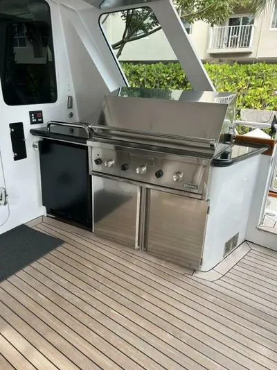 Toto Yacht Photos Pics Outdoor kitchen on a 1983 Palmer Johnson 110 Cruising Sloop with stainless steel grill.