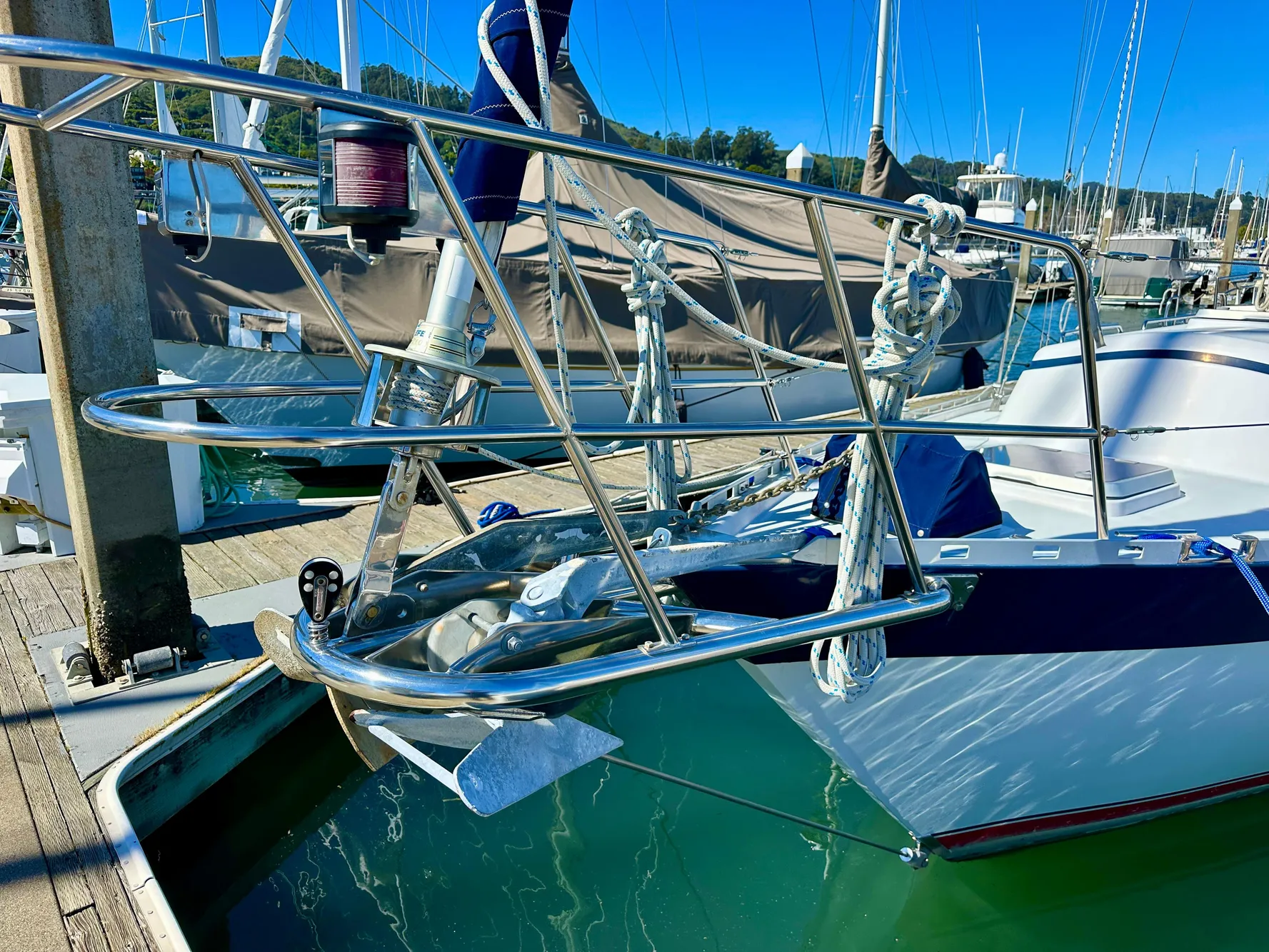 Valiant 39 sailboat, 1996 model, docked in marina with clear blue sky.