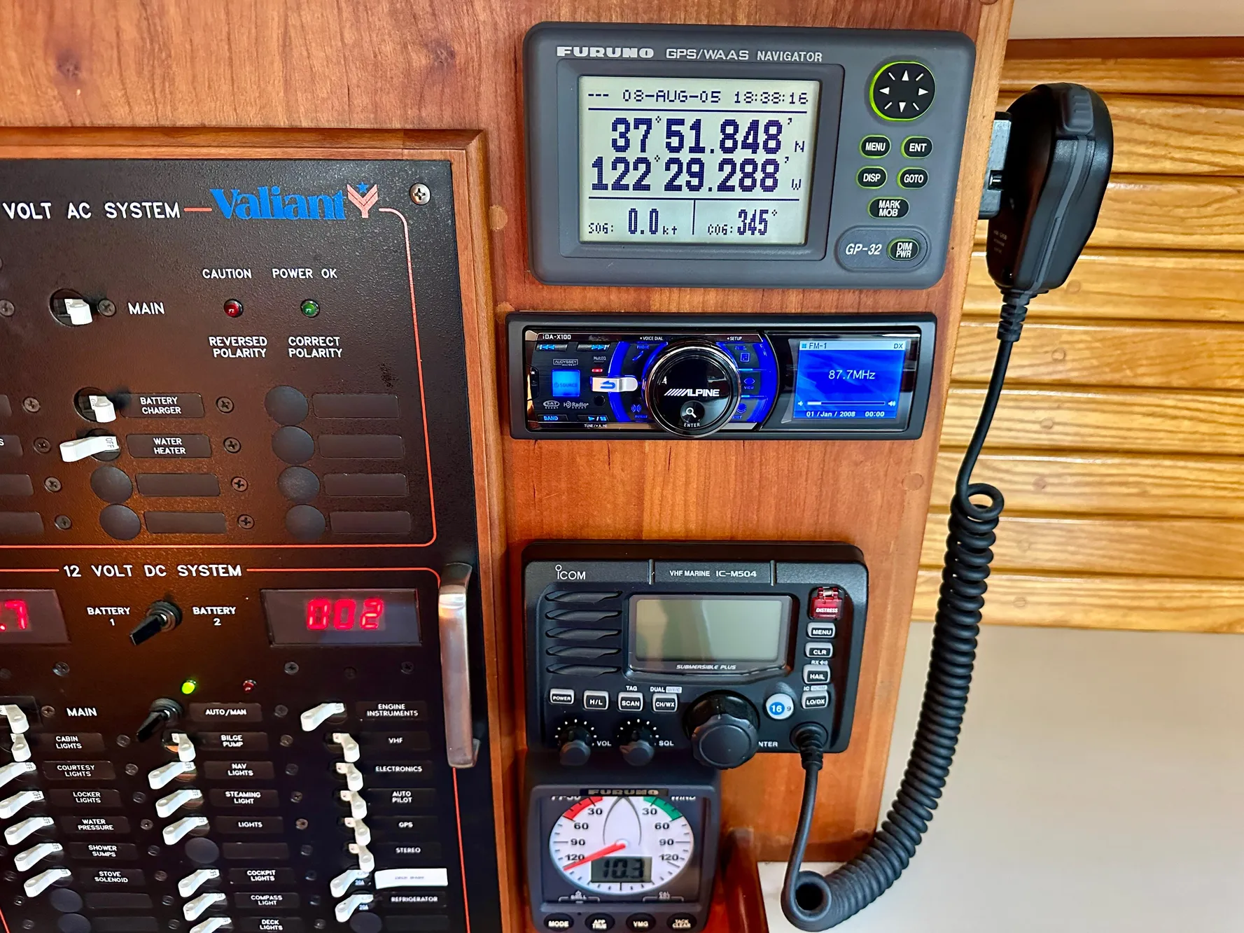 Control panel of a 1996 Valiant 39 yacht with navigation and communication equipment.