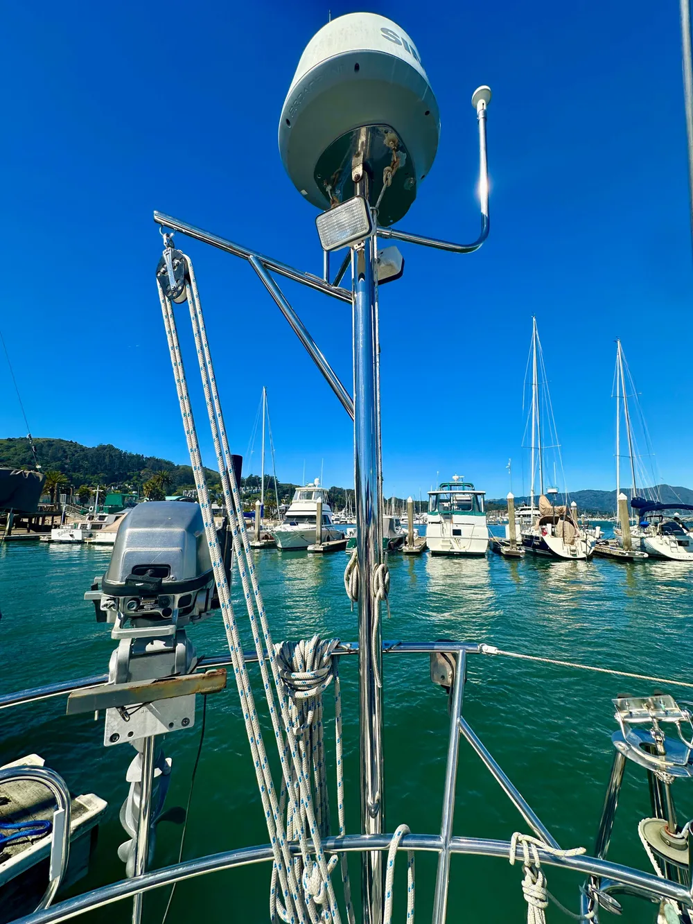 Sailboat Valiant 39, 1996 model, docked in marina with clear blue sky.