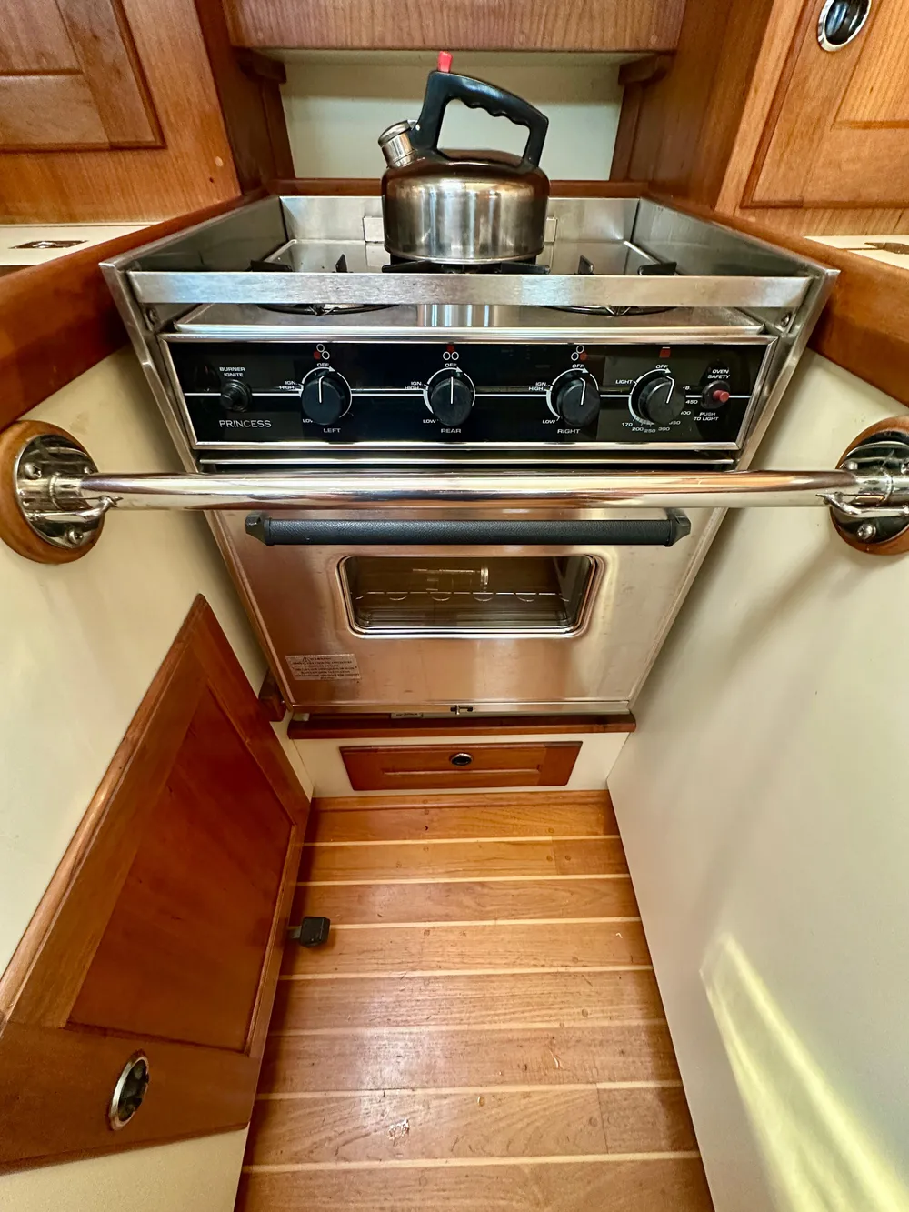 1996 Valiant 39 yacht kitchen with stove, oven, and kettle.