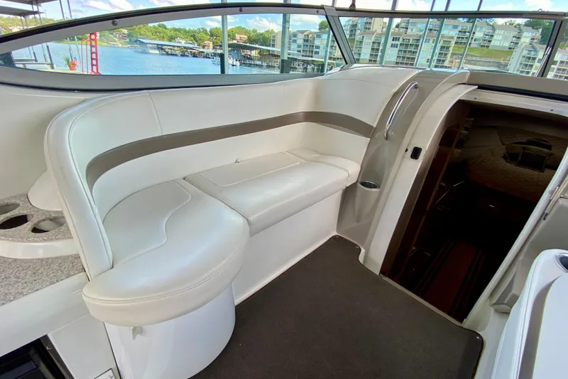  Yacht Photos Pics 2004 Formula 37 PC yacht interior with white seating and lake view.