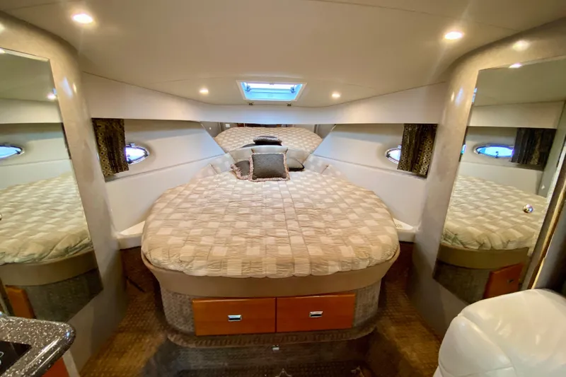  Yacht Photos Pics Luxurious 2004 Formula 37 PC yacht cabin with cozy bed and elegant lighting.