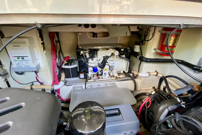 Yacht Photos Pics Engine compartment of a 2004 Formula 37 PC boat, featuring various mechanical components.