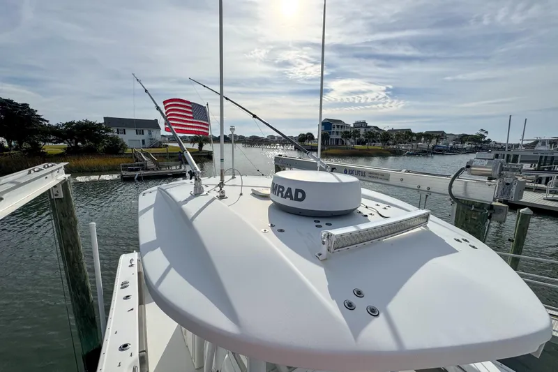  Yacht Photos Pics 2021 Cape Horn 31 T boat with radar, American flag, docked in marina.