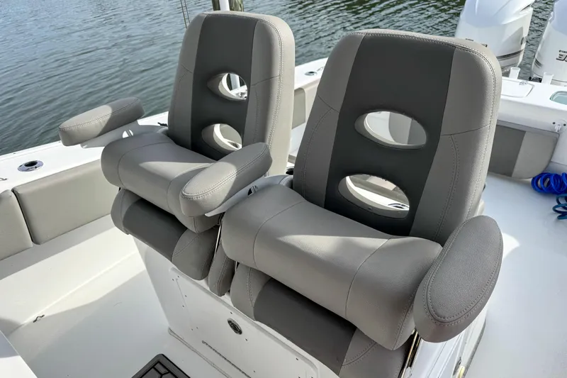  Yacht Photos Pics Luxury seating on 2021 Cape Horn 31 T boat, featuring comfortable armrests and modern design.