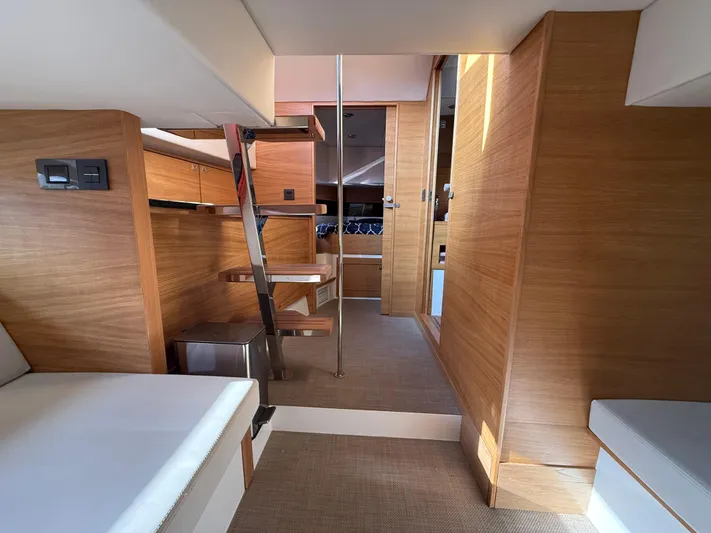  Yacht Photos Pics Interior of 2021 De Antonio Yachts D42, featuring modern wood finishes and sleek design.