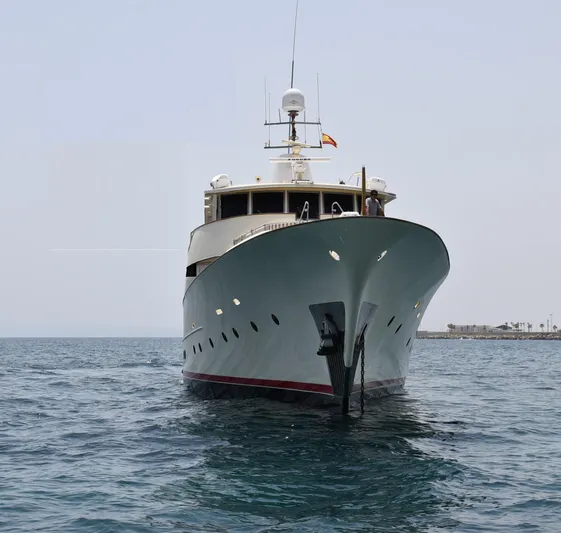  Yacht Photos Pics Explorer Classic 34m yacht from 2005 on open water, front view.