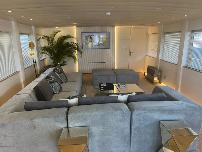  Yacht Photos Pics Luxurious interior of 2005 Explorer Classic 34m yacht with modern decor and comfortable seating.