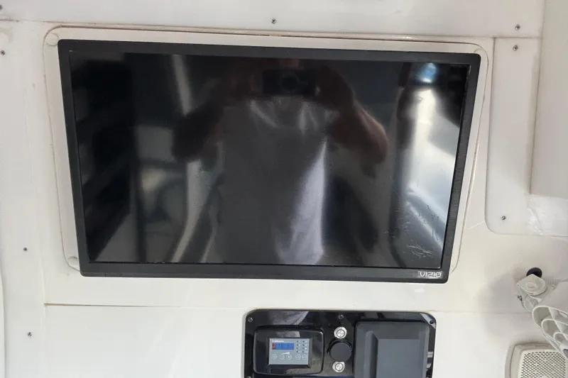  Yacht Photos Pics 2024 GSX 36 interior with Vizio TV and control panel.