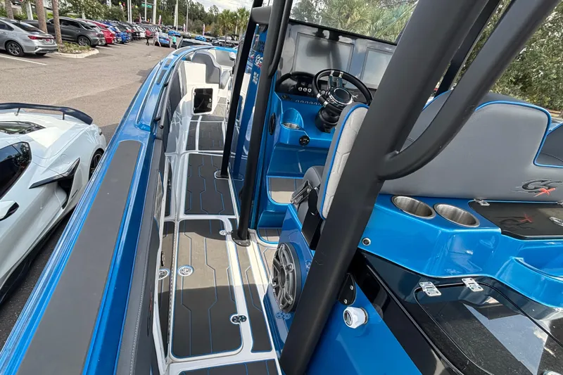 Yacht Photos Pics 2024 GSX 36 boat interior with blue accents and modern dashboard design.