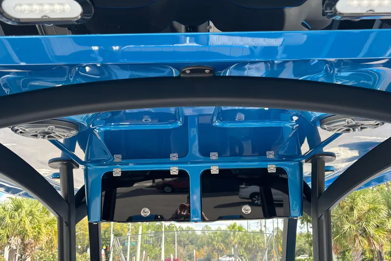  Yacht Photos Pics 2024 GSX 36 boat interior with blue canopy and speakers.