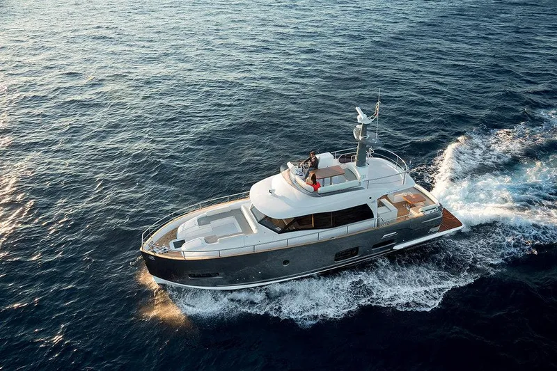  Yacht Photos Pics Azimut Magellano 53 yacht cruising on open sea, 2015 model.