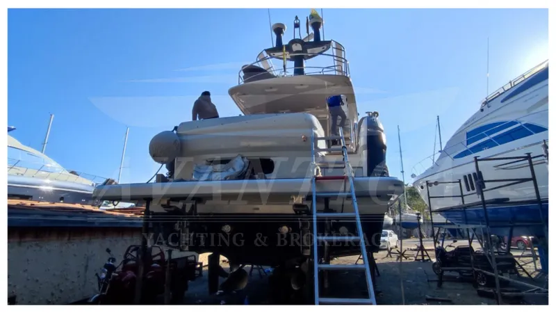  Yacht Photos Pics 2015 Azimut Magellano 53 yacht in dry dock, rear view with maintenance ladder.