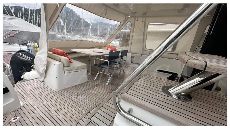  Yacht Photos Pics Azimut Magellano 53 yacht interior, 2015 model, featuring a spacious seating and dining area.