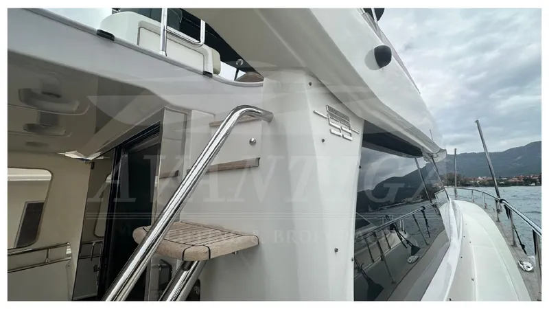  Yacht Photos Pics Azimut Magellano 53 yacht, 2015 model, exterior view with stairs and sleek design.