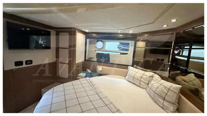  Yacht Photos Pics Luxurious cabin interior of 2015 Azimut Magellano 53 yacht with modern amenities.