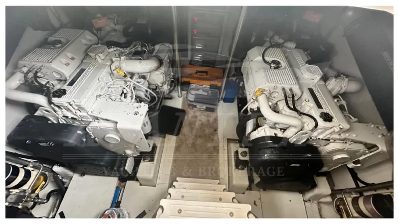  Yacht Photos Pics Engine room of 2015 Azimut Magellano 53 yacht, featuring dual engines and mechanical components.