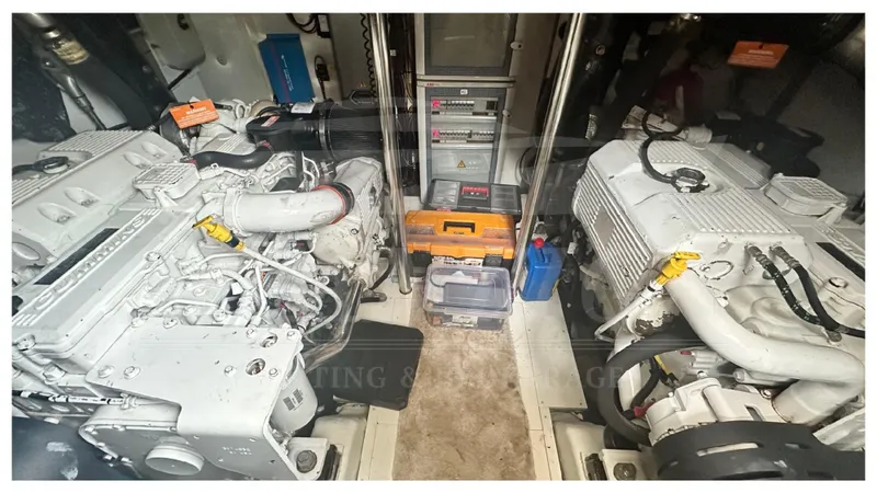  Yacht Photos Pics Engine room of 2015 Azimut Magellano 53 yacht, featuring dual engines and equipment.