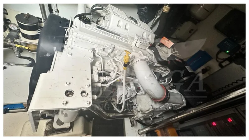  Yacht Photos Pics Engine room of 2015 Azimut Magellano 53 yacht, showcasing detailed machinery components.