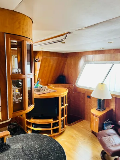 Journey Yacht Photos Pics Luxurious interior of 2001 Bracewell Latitude 47 yacht with elegant wood finishes and modern furnishings.