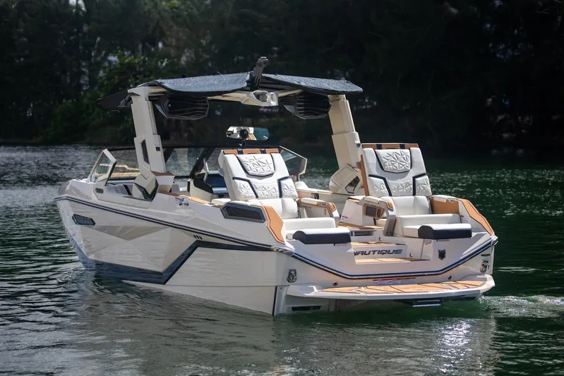  Yacht Photos Pics 2025 Nautique Super Air Nautique G25 Paragon on water, showcasing luxury design and features.