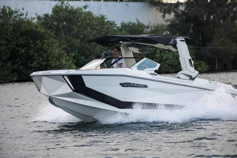  Yacht Photos Pics 2025 Nautique Super Air Nautique G25 Paragon cruising on water, sleek design, modern features.