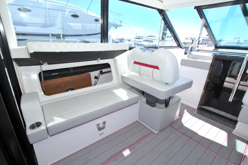 Elena Trinidad Yacht Photos Pics 2021 Regal 36 XO yacht interior with modern seating and sleek design.
