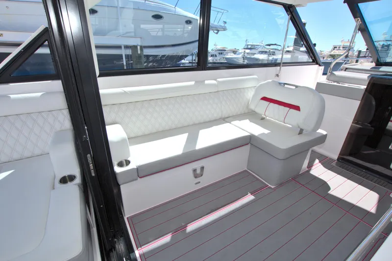Elena Trinidad Yacht Photos Pics 2021 Regal 36 XO boat interior with white seating and modern design.