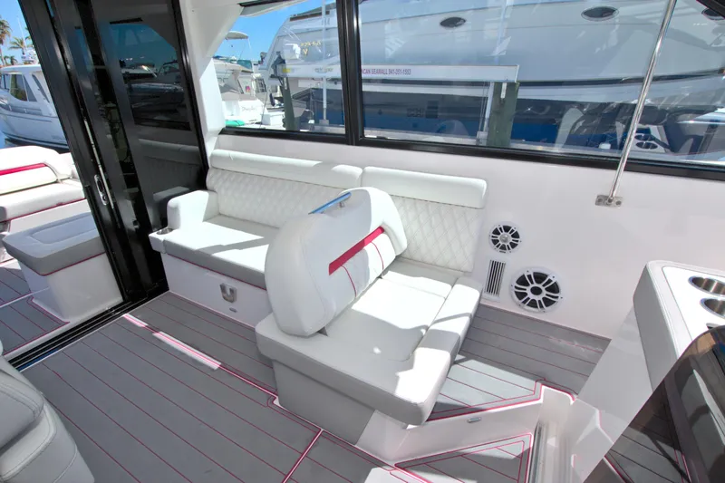 Elena Trinidad Yacht Photos Pics 2021 Regal 36 XO yacht interior with white seating and modern design.