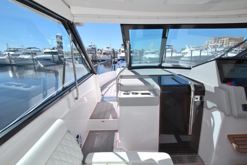 Elena Trinidad Yacht Photos Pics 2021 Regal 36 XO yacht interior with marina view, featuring sleek design and modern amenities.