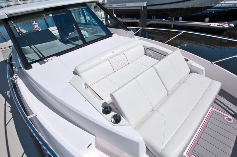 Elena Trinidad Yacht Photos Pics 2021 Regal 36 XO boat with white seating and sleek design.