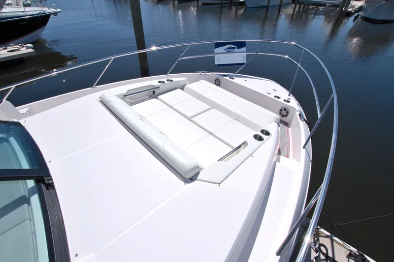 Elena Trinidad Yacht Photos Pics 2021 Regal 36 XO yacht with spacious sunbathing deck, docked at marina.