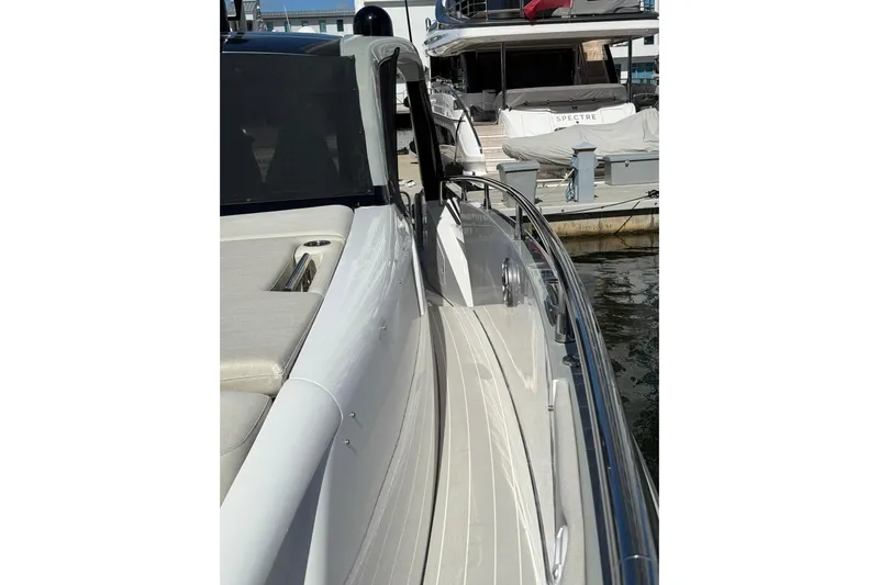 Chicken Money Yacht Photos Pics 2023 Azimut Verve 47 yacht docked, showcasing sleek design and luxurious features.