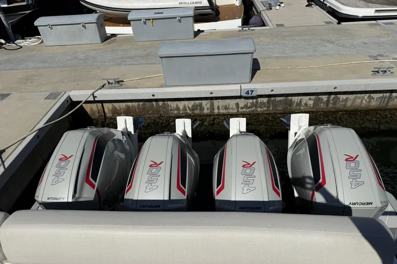 Chicken Money Yacht Photos Pics Four powerful Mercury 450R outboard engines on a 2023 Azimut Verve 47 yacht.