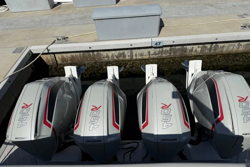 Chicken Money Yacht Photos Pics Four powerful Mercury 450R outboard engines on a 2023 Azimut Verve 47 boat.