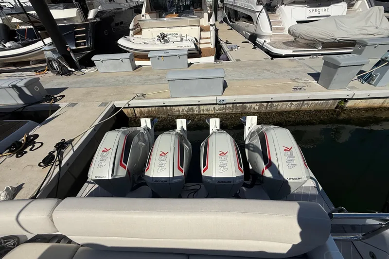 Chicken Money Yacht Photos Pics 2023 Azimut Verve 47 with four Mercury 450R outboard engines docked at marina.