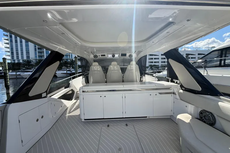 Chicken Money Yacht Photos Pics 2023 Azimut Verve 47 yacht interior with sleek seating and modern design.