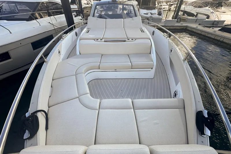 Chicken Money Yacht Photos Pics 2023 Azimut Verve 47 yacht with spacious deck and luxurious seating.